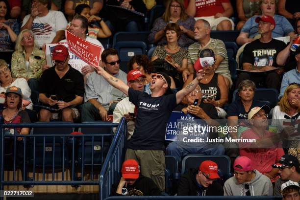 Supporters of U.S. President Donald Trump attend a rally at the Covelli Centre on July 25, 2017 in Youngstown, Ohio. The rally coincides with the...