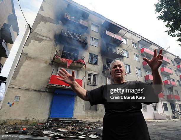 Woman cries after her house was hit by a Russian shell on August 12, 2008 in Gori, Georgia. Russian President Dmitry Medvedev has ordered an end to...