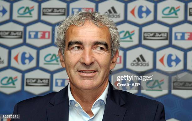 France coach Raymond Domenech smiles during a press conference at the French Football Federation headquarters on August 12 in Paris. Domenech...