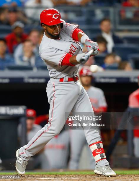 Arismendy Alcantara of the Cincinnati Reds connects on a sixth inning run scoring ground out against the New York Yankees at Yankee Stadium on July...