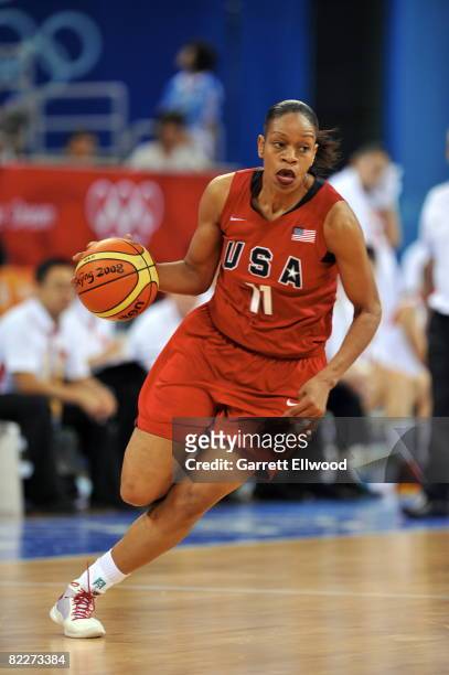 Tina Thompson of the U.S. Women's Senior National Team drives against China during day 3 of the women's preliminary basketball game at the 2008...