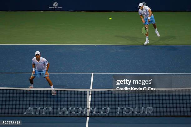 Bob Bryan serves to John-Patrick Smith of Australia and Matt Reid during the BB&T Atlanta Open at Atlantic Station on July 25, 2017 in Atlanta,...