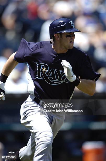 Evan Longoria of the Tampa Bay Rays runs to first base after hitting the ball during the game against the Kansas City Royals at Kauffman Stadium in...