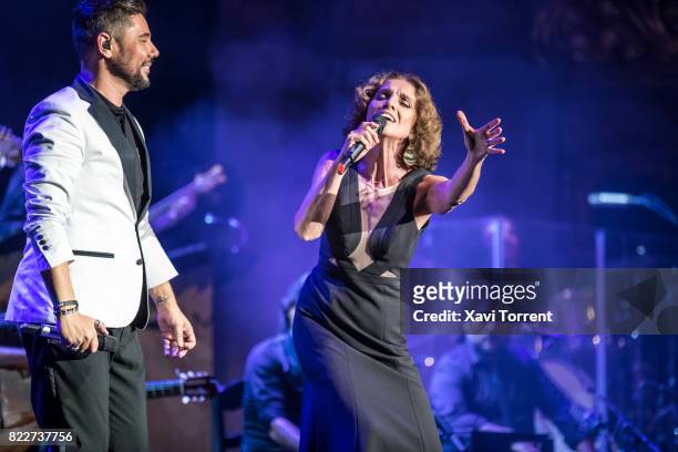 Miguel Poveda and Ana Belen perform on stage during the 'Miguel Poveda & Amigos' Gala at Gran Teatre del Liceu on July 25, 2017 in Barcelona, Spain.