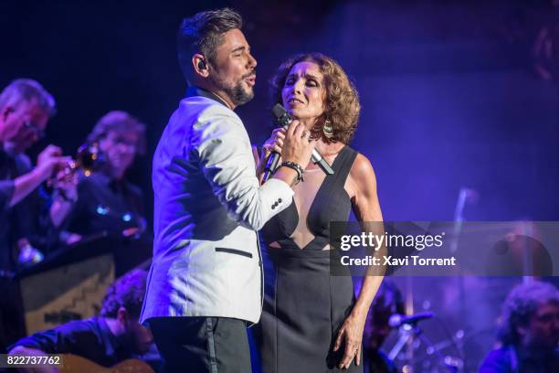 Miguel Poveda and Ana Belen perform on stage during the 'Miguel Poveda & Amigos' Gala at Gran Teatre del Liceu on July 25, 2017 in Barcelona, Spain.