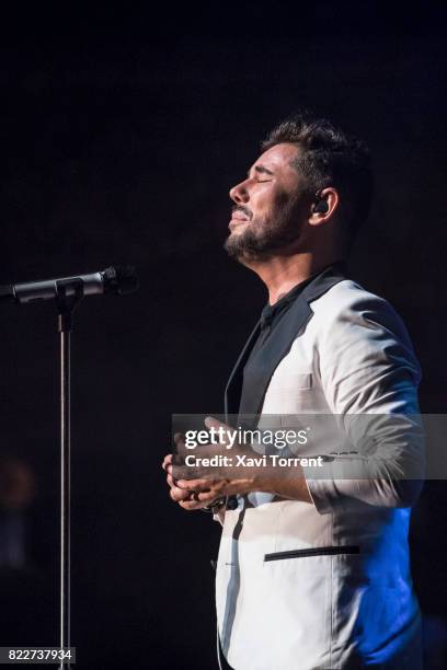 Miguel Poveda performs on stage during the 'Miguel Poveda & Amigos' Gala at Gran Teatre del Liceu on July 25, 2017 in Barcelona, Spain.