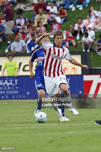 Justin Braun of Chivas USA dribbles against the Kansas City Wizards during the game at Community America Ballpark on August 9, 2008 in Kansas City,...