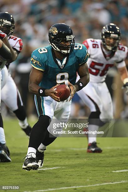 David Garrard of the Jacksonville Jaguars drops back against the Atlanta Falcons at Jacksonville Municipal Stadium on August 9, 2008 in Jacksonville,...