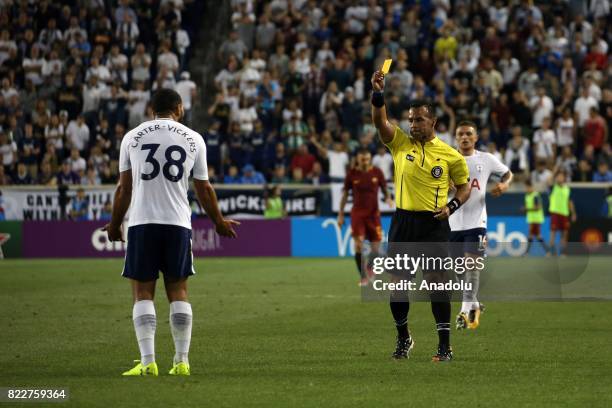 Referee shows a yellow card to Carter-Vickers of Tottenham during International Champions Cup 2017 friendly match between Roma and Tottenham at...