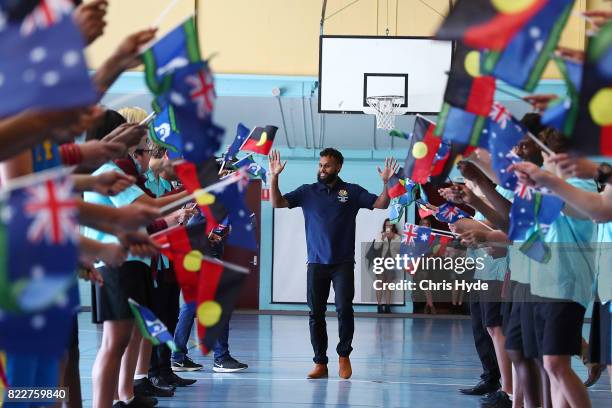 Australian basketball champion Patty Mills arrives at Keebra Park High School on July 26, 2017 in Gold Coast, Australia. Mills has been announced as...