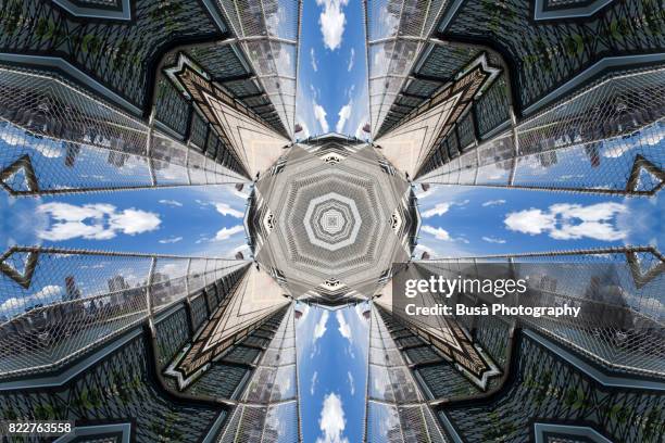 abstract image: kaleidoscopic image of pasageway on the manhattan bridge, new york city - kaleidoskop stock-fotos und bilder