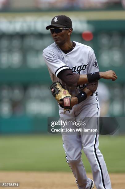 Second baseman Alexei Ramirez of the Chicago White Sox fields his position as he throws to first base after fielding a ground ball during the game...