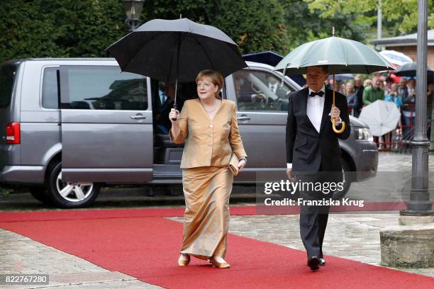 German chancellor Angela Merkel and her husband Joachim Sauer attend the Bayreuth Festival 2017 Opening on July 25, 2017 in Bayreuth, Germany.