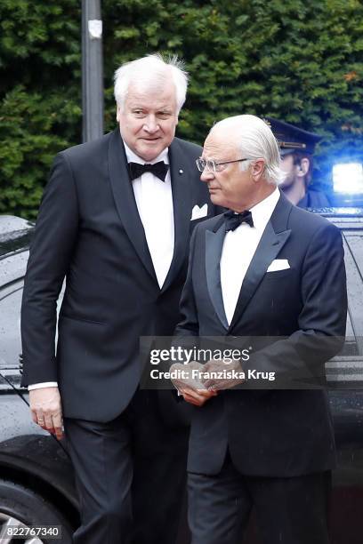 Bavarian State Governor Horst Seehofer and King of Sweden Carl XVI Gustaf attend the Bayreuth Festival 2017 Opening on July 25, 2017 in Bayreuth,...