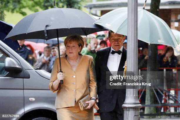 German chancellor Angela Merkel and her husband Joachim Sauer attend the Bayreuth Festival 2017 Opening on July 25, 2017 in Bayreuth, Germany.