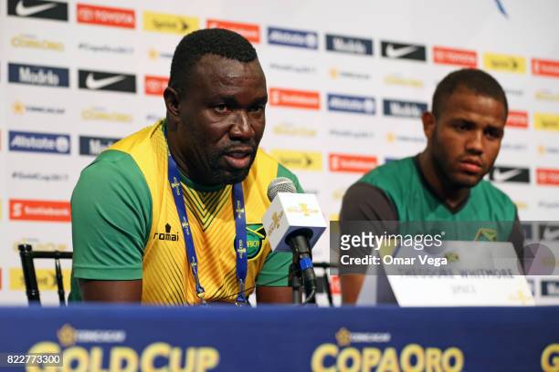 Theodore Whitmore coach of Jamaica speaks during the Jamaica National Team Press Conference prior to the final match against United States at Levi's...