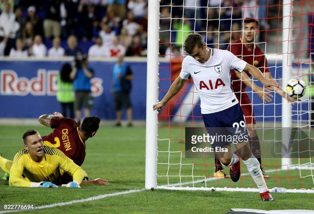 Harry Winks of Tottenham Hotspur celebrates his goal in the second half as Lukasz Skorupski of Roma reacts during the International Champions Cup on...