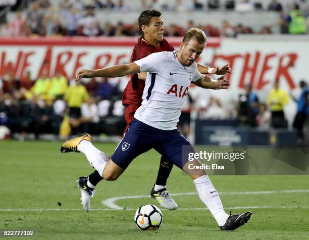 Harry Kane of Tottenham Hotspur takes the ball as Hector Moreno of Roma defends during the International Champions Cup on July 25, 2017 at Red Bull...