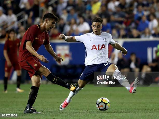 Lorenzo Pellegrini of Roma passes the ball as Anthony Georgiou of Tottenham Hotspur defends during the International Champions Cup on July 25, 2017...