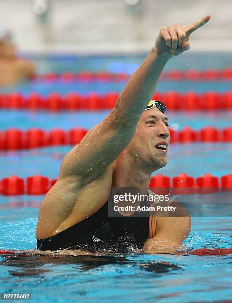 Alain Bernard of France finishes the Men's 100m Freestyle Semifinal 1 in first place held at the National Aquatics Center on Day 5 of the Beijing...