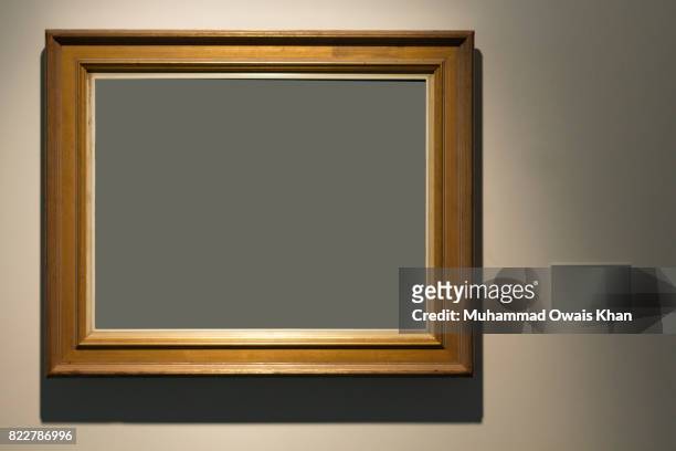 picture frame on wall - photo exhibition stock pictures, royalty-free photos & images