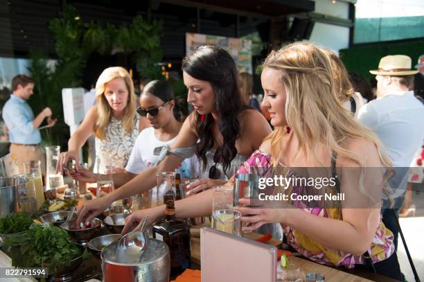 Guests enjoy the Cointreau Celebrates the Original Margarita and the Art of La Soiree with Caroline Harper Knapp at DEC on Dragon on July 25, 2017 in...