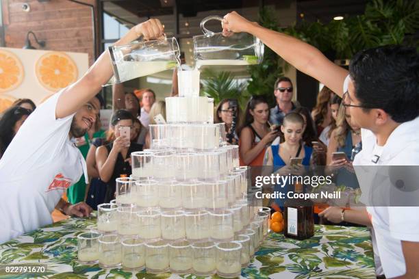 Guests look on during the margarita tower at the Cointreau Celebrates the Original Margarita and the Art of La Soiree with Caroline Harper Knapp at...