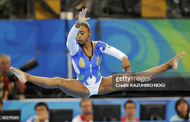 Brazil's Daiane Santos competes on the floor during the women's team final of the artistic gymnastics event of the Beijing 2008 Olympic Games in...