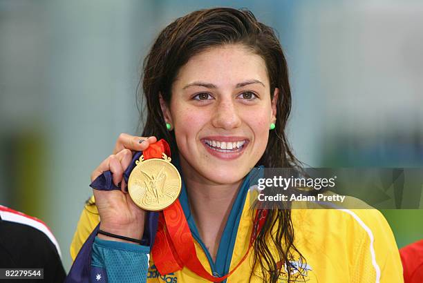 Stephanie Rice of Australia poses with the gold medal during the medal ceremony for the Women's 200m Individual Medley held at the National Aquatics...