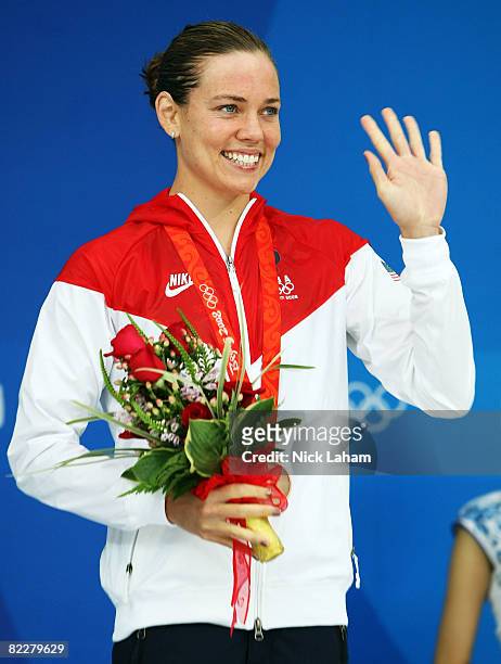 Natalie Coughlin of the United States poses with the bronze medal during the medal ceremony for the Women's 200m Individual Medley at the National...