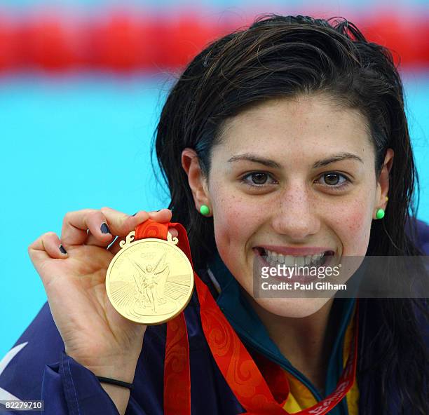 Stephanie Rice of Australia poses with the gold medal during the medal ceremony for the Women's 200m Individual Medley held at the National Aquatics...