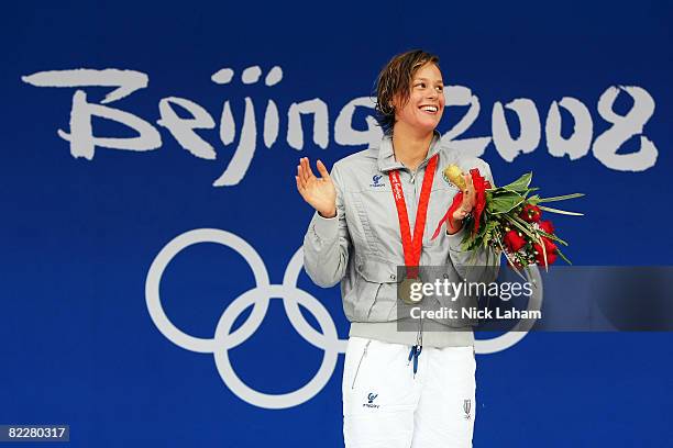 Federica Pellegrini of Italy poses with the gold medal during the medal ceremony for the Women's 200m Freestyle held at the National Aquatics Center...