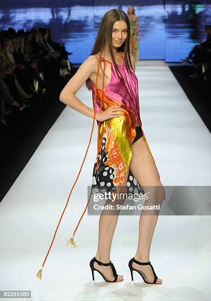 Model showcases designs by Charlie Brown on the catwalk, as part of the inaugural Rosemount Sydney Fashion Festival 2008 at Martin Place on August...