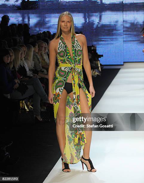 Model showcases designs by Charlie Brown on the catwalk, as part of the inaugural Rosemount Sydney Fashion Festival 2008 at Martin Place on August...