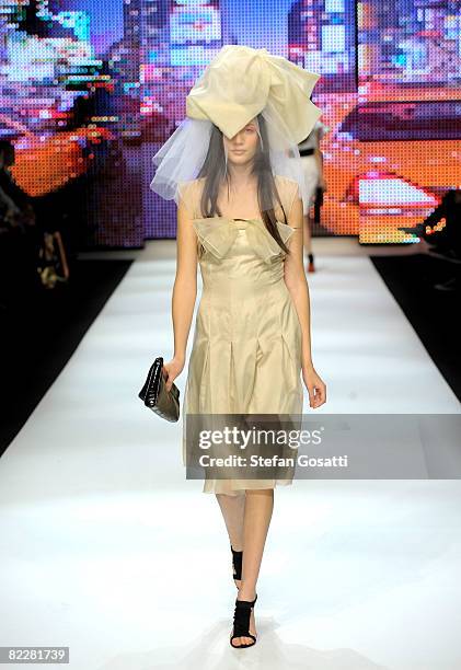 Model showcases designs by Charlie Brown on the catwalk, as part of the inaugural Rosemount Sydney Fashion Festival 2008 at Martin Place on August...