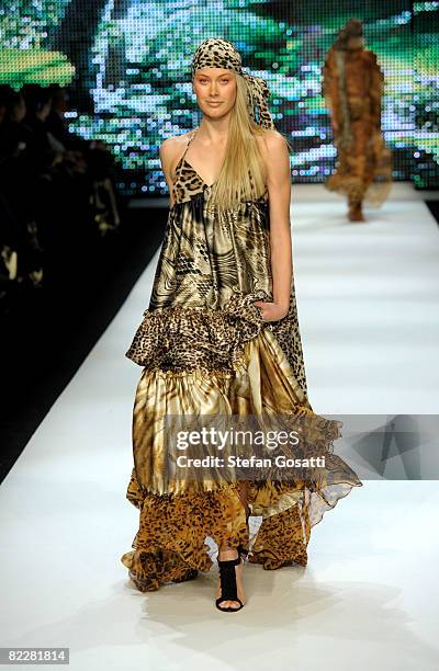 Model showcases designs by Charlie Brown on the catwalk, as part of the inaugural Rosemount Sydney Fashion Festival 2008 at Martin Place on August...