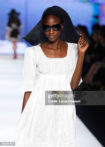 Model showcases designs by Charlie Brown on the catwalk, as part of the inaugural Rosemount Sydney Fashion Festival 2008 at Martin Place on August...