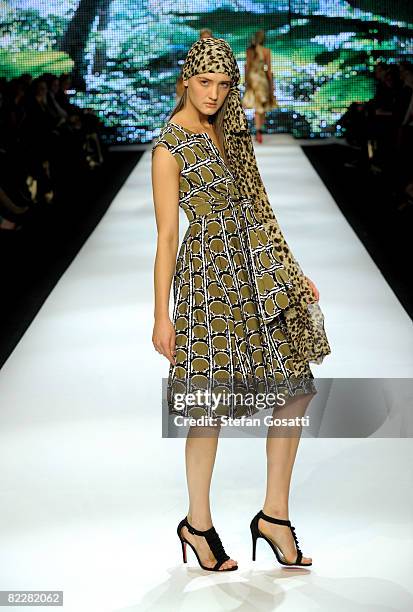 Model showcases designs by Charlie Brown on the catwalk, as part of the inaugural Rosemount Sydney Fashion Festival 2008 at Martin Place on August...