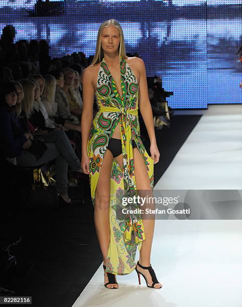 Model showcases designs by Charlie Brown on the catwalk, as part of the inaugural Rosemount Sydney Fashion Festival 2008 at Martin Place on August...