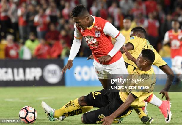 Jorge Obregon of Independiente Santa Fe is fouled during the match between Independiente Santa Fe and Fuerza Amarilla as part of the Copa Conmebol...