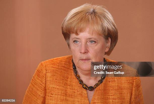 German Chancellor Angela Merkel arrives for the weekly German government cabinet meeting on August 13, 2008 in Berlin, Germany. High on the morning's...