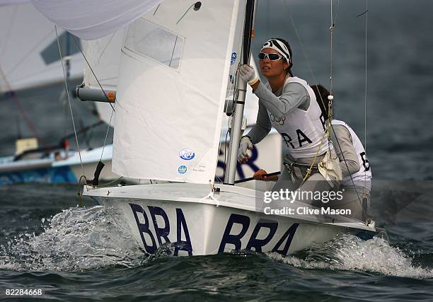 Fernanda Oliveira and Isabel Swan of Brazil compete in the Women's 470 class race held at the Qingdao Olympic Sailing Center during day 5 of the...