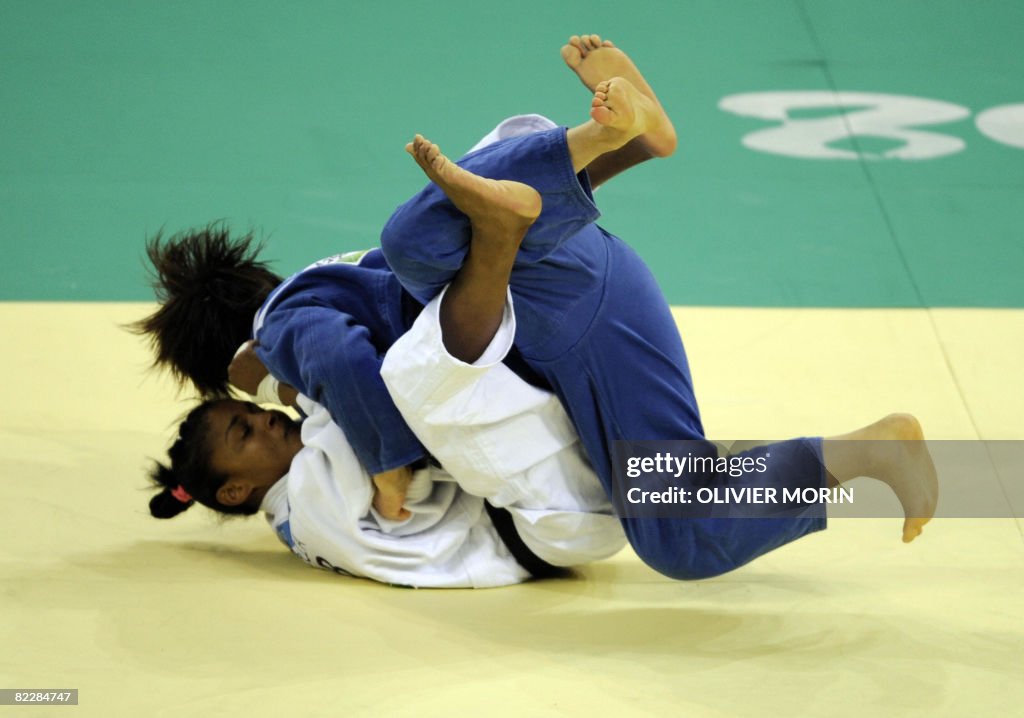 Japan's Masae Ueno (top) and Cuba's Anay