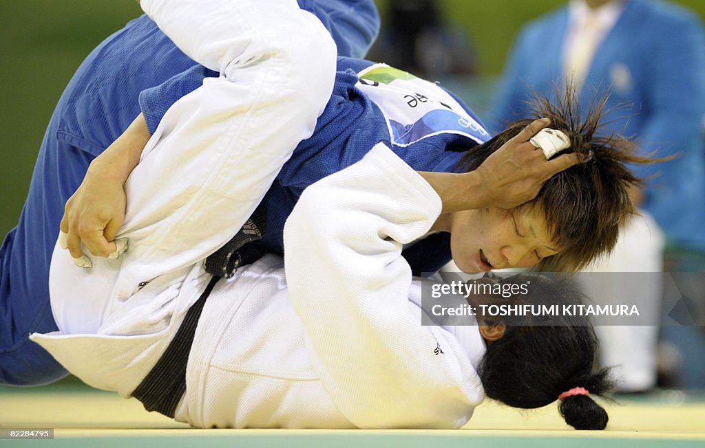 Japan's Masae Ueno (top) and Cuba's Anay