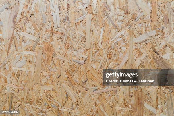 close-up of a particle board background texture. - plywood texture stockfoto's en -beelden