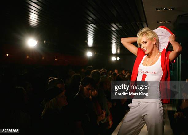 Model showcases designs by PUMA on the catwalk during their Summer Parade show, as part of the inaugural Rosemount Sydney Fashion Festival 2008 at...