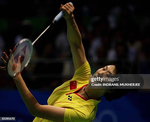 China's Lu Lan plays a shot against Malaysia's Wong Mew Choo during their women's singles quarter-final badminton match for the 2008 Beijing Olympic...