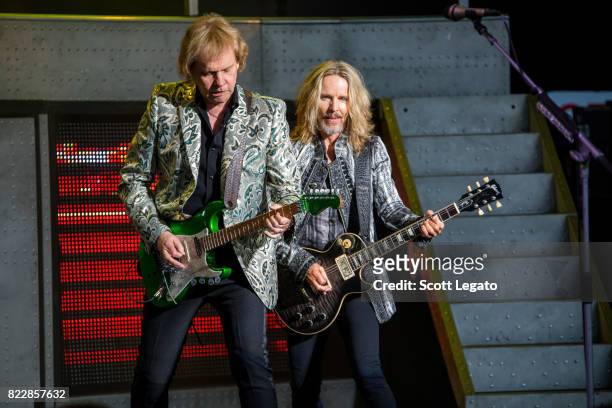 James Young and Tommy Shaw of STYX perform at DTE Energy Music Theater on July 25, 2017 in Clarkston, Michigan.