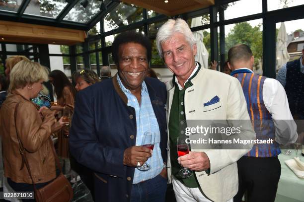 Roberto Blanco and Frederic Meisner during the 'La Dolce Vita Grillfest' at Gruenwalder Einkehr on July 25, 2017 in Munich, Germany.