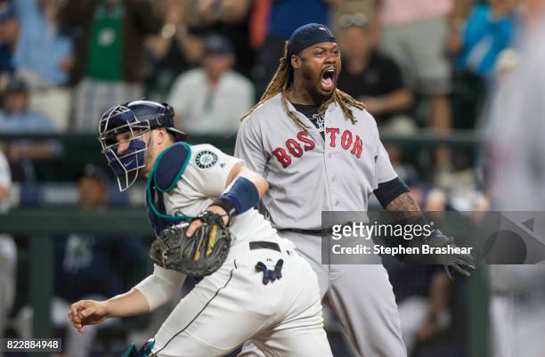 Hanley Ramirez of the Boston Red Sox celebrates scoring a run on a single by Sandy Leon of the Boston Red Sox game off of relief pitcher Tony Zych of...